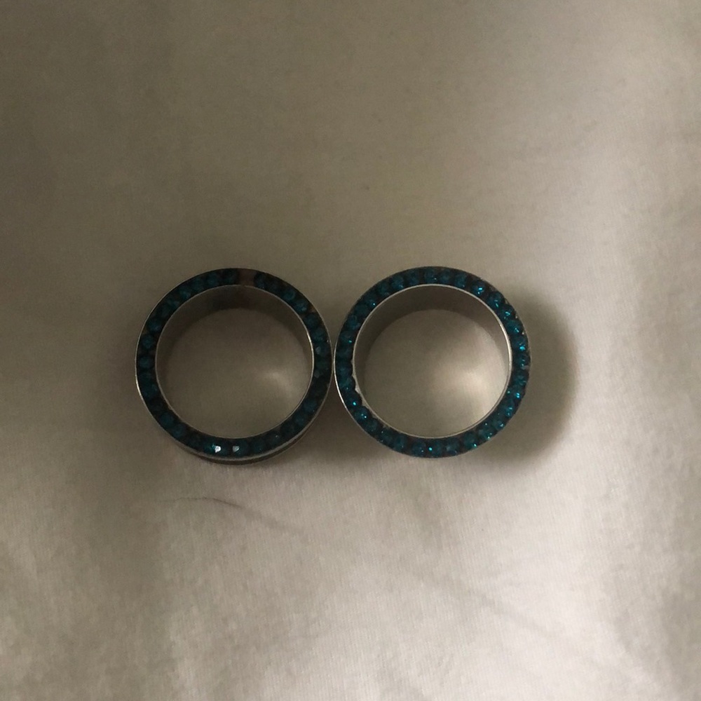 Never worn. Swarovski Gem (blue zircon) tunnels.